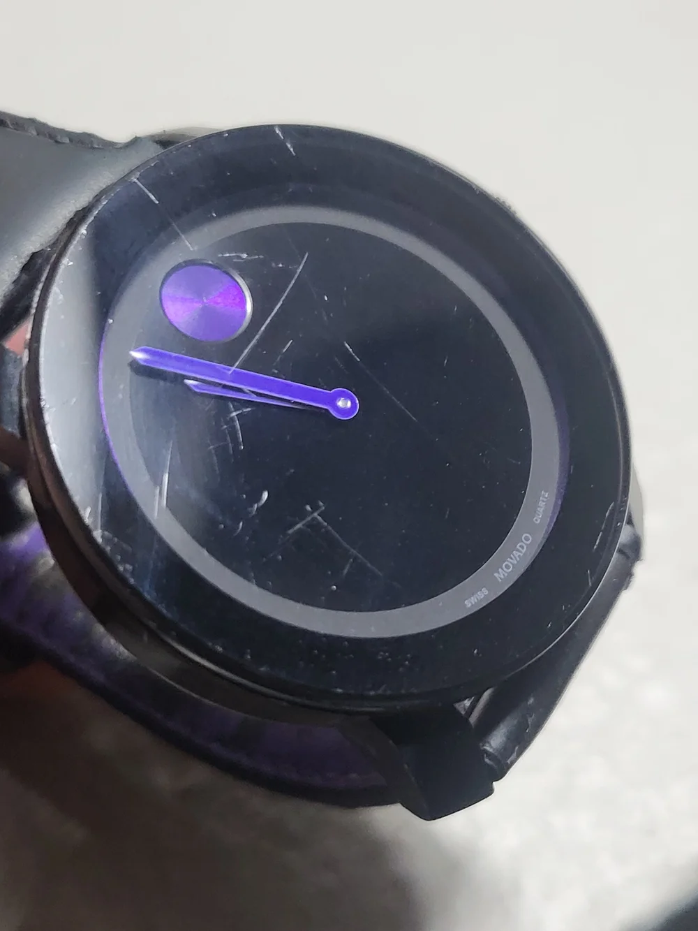 Movado Black Leather Watch with Purple Accent